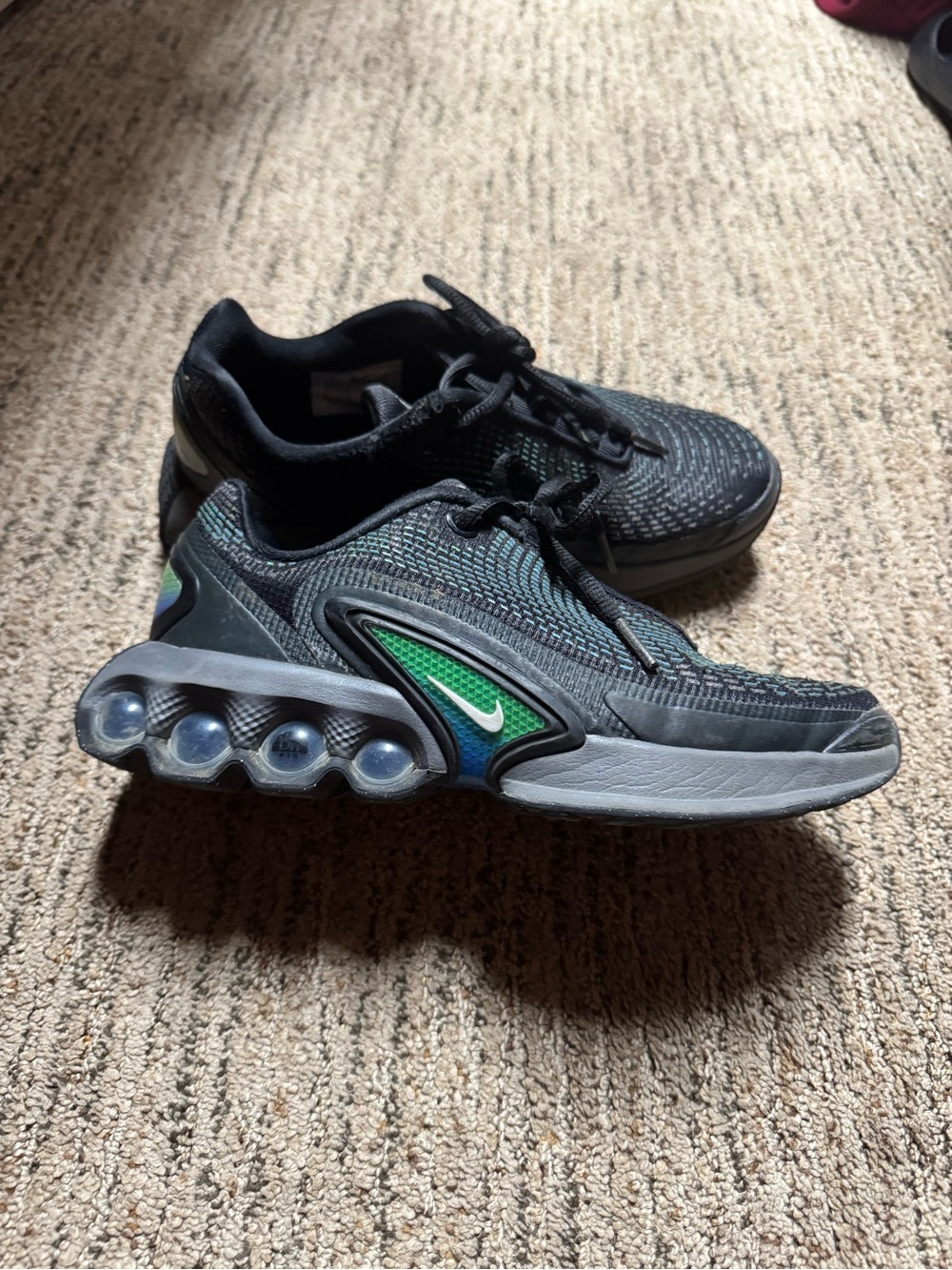 Nike Kids Black Sneakers with Green Accent